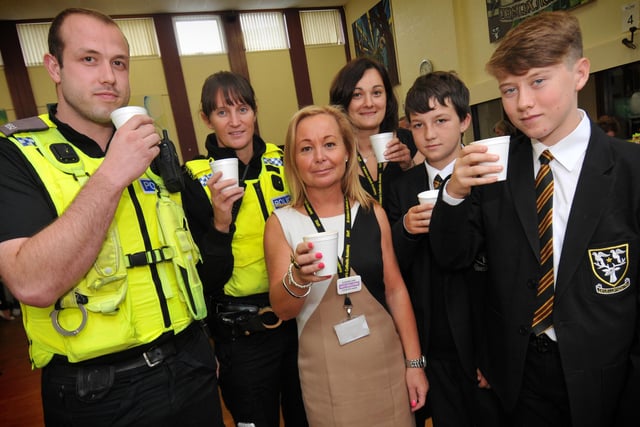 PC Jordan Sharp and PC Kami Tomlinson were pictured in 2013 at the St Aidan's Catholic Academy coffee morning with Julie Small, Kasia Szczepanska and pupils Jake Lee and Ben Ingram.
