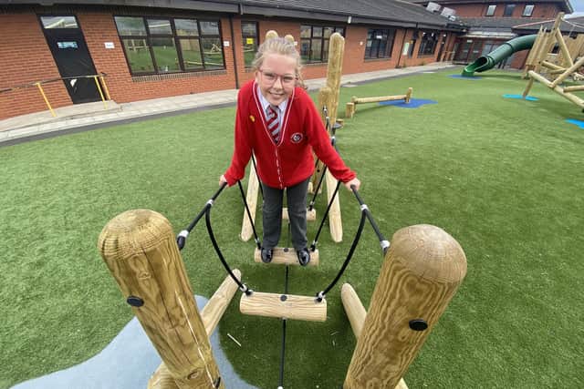 Grace McCartney, 11, on the new adventure play-park at Diamond Hall Junior Academy.  

Picture by FRANK REID