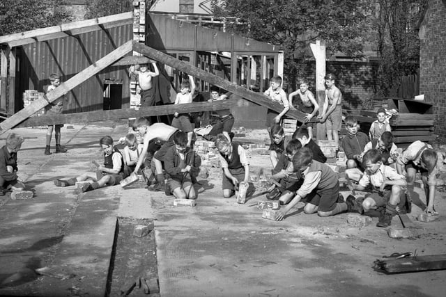 Members of Sunderland Round Table Coronation Scout Troop at work on their new headquarters which they were building themselves in the grounds of Sunderland General Hospital in 1953.