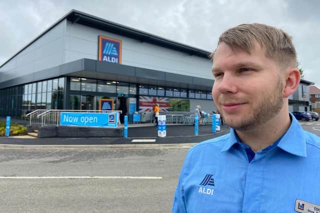Store manager Rikki Elliott outside the new Aldi store in Pennywell.