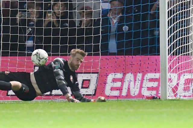 Lee Burge saves Charlie Austin's penalty