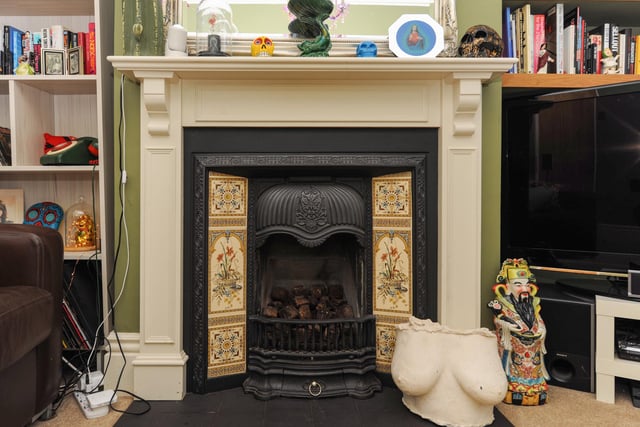 This fireplace is typical of the charming features in the three bed home.