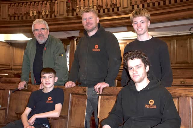 Ben, Will and Matty, supervised by woodworkers Pete Watson and Nathan Hopkins, are among the people working on the restoration of Durham Miners Hall.
