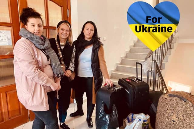 Joanna (middle) with one of the volunteers at the accommodation (left) and Magda, who set up and runs the operation, (right) as she delivered the supplies.