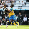 Southampton's Mohammed Salisu challenging with Newcastle United's Callum Wilson (Photo by Ian MacNicol/Getty Images)