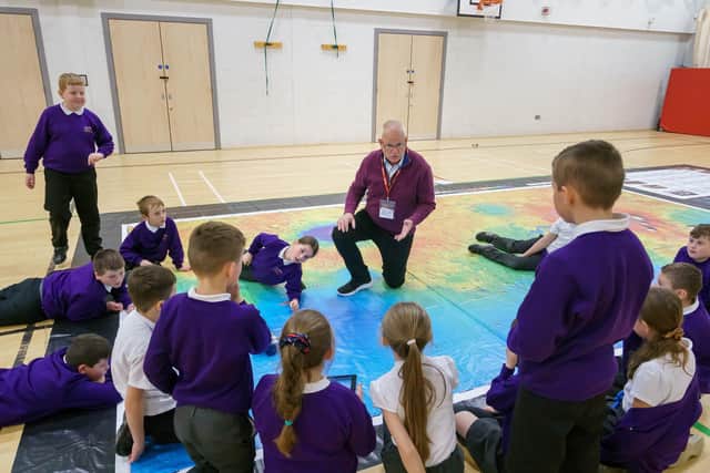 Aldrin Family Foundation Chief Innovation Officer Jim Christensen with Academy 360 Year 5 pupils.

Picture: DAVID WOOD