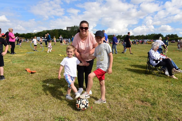 Kim Parkinson, 36, with children Grayson, three, and Ashton, seven, enjoying the sunshine at the Active Sunderland Summer Family Fun event at Herrington Country Park.