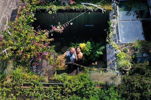 An aerial view of Gary McLaughlan and his wife Lindsey in their garden. Issue date: Wednesday July 7, 2021. Owen Humphreys/PA Wire