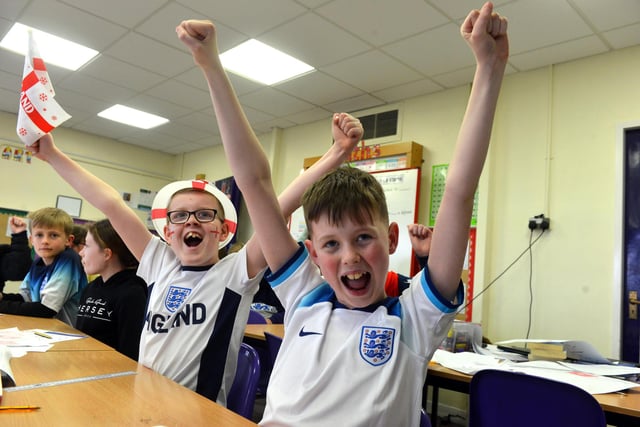Hasting Hill Academy pupils celebrate England's opening goal.