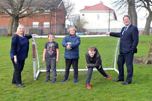 Thornhill Park School headteacher Christine Cave, far left, and chief executive John Phillipson, far right, with pupils, from left, Isaac, Callum and Zac in the play area they are hoping to transform.