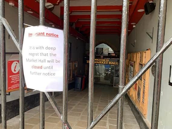 The closed sign up at Durham's Market Hall