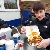 Fenton Frank, 13, with his fish, chips and gravy.