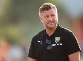 BANBURY, ENGLAND - JULY 21: Karl Robinson, Manager of Oxford United looks on prior to the Pre-Season Friendly match between Banbury United and Oxford United at The Banbury Plant Hire Community Stadium on July 21, 2021 in Banbury, England. (Photo by Alex Burstow/Getty Images)