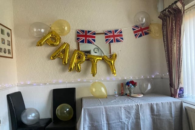 Balloons, bunting and fairy lights for a party at home in Sunderland.