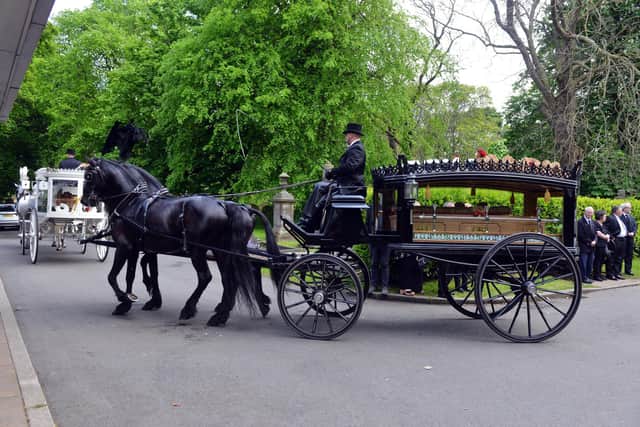 The funeral of Alastair and son Mark Rennie.