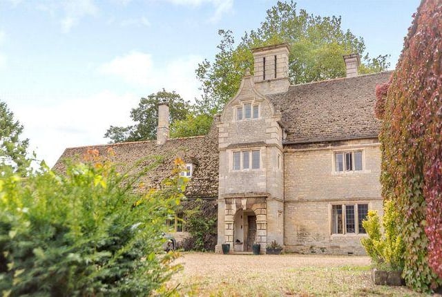 Another Grade II listed property, this farmhouse is builty from ashlar stone under Collyweston slate roof and has distinctive Ogee shaped stone gables. It boasts a principal bedroom with en suite, as well as a further six bedrooms and family bathroom. The mature gardens, with small paddocks, extends approximately 1.55 acres. Guide price £1,100,000.