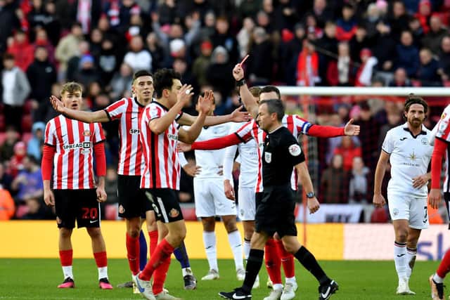 Luke O'Nien was shown a red card early in Sunderland's defeat to Swansea City