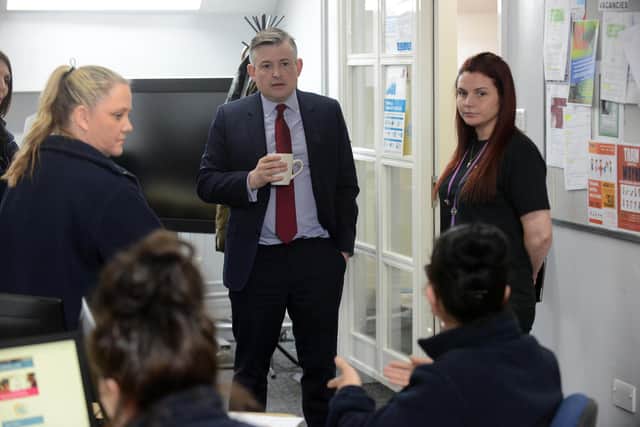 Shadow Secretary of State for Work and Pensions Jonathan Ashworth talking with  Pallion Action Group staff, Sam Ayr and Hazel Cox.