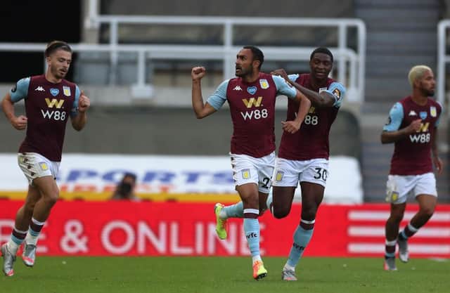 Ahmed El Mohamady of Aston Villa celebrates with Kortney Hause after scoring.