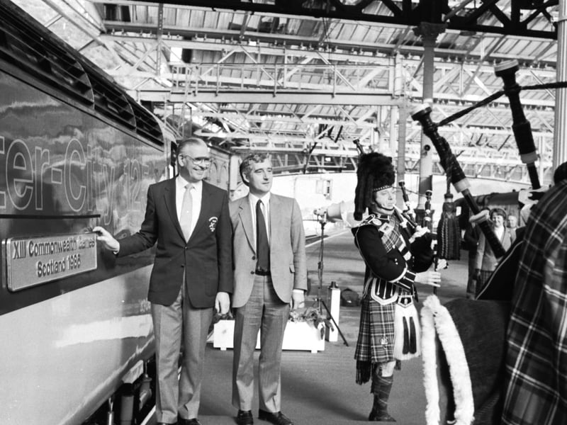 Former Edinburgh Lord Provost Kenneth Borthwick (left) and Scotrail's Chris Green with the newly-named Inter-City 125 train - "XIII Commonwealth Games Scotland 1986" - at Waverley station.