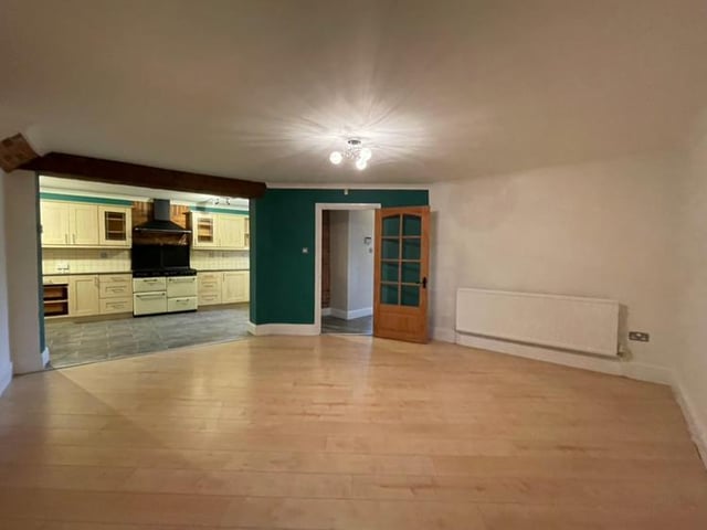 A second shot of the dining room, which shows the open-plan access to the kitchen, making the house flow effortlessly.