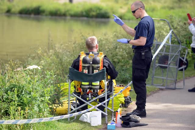 Specialist Search and Rescue Marine Unit carrying out diving search at Silksworth Lake