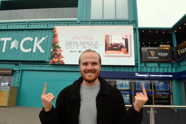 Singer songwriter Will Jennison get his new single advertised at STACK Seaburn.
