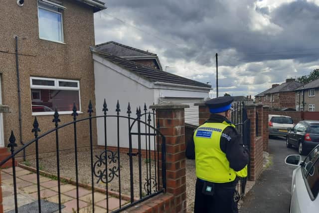Police officer in Burns Avenue South following suspected stabbing