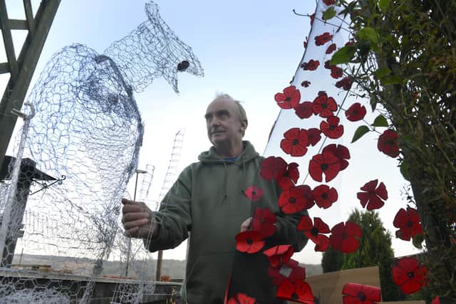 The sculpture stands proudly in Barry's garden ahead of Remembrance Sunday.