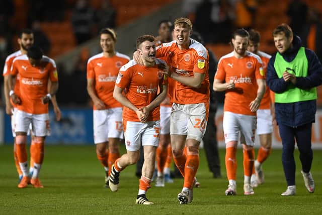 Blackpool players Elliot Embleton and Daniel Ballard celebrate after the Sky Bet League One Play-off semi-final second leg match between Blackpool and Oxford United at Bloomfield Road.
