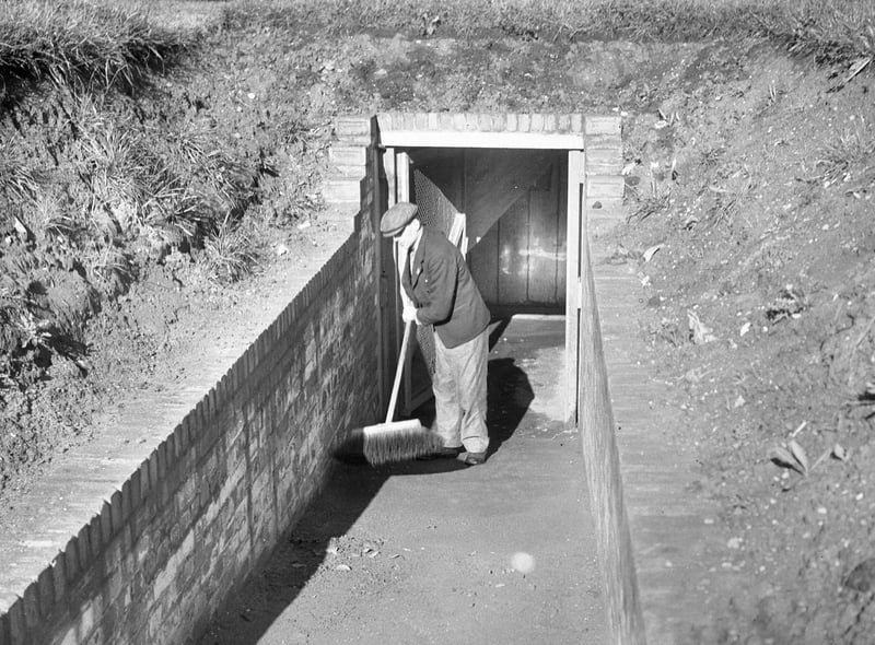 This worker was making sure an air raid shelter was kept in a clean condition in September 1940.