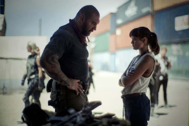 ARMY OF THE DEAD (L to R) DAVE BAUTISTA as SCOTT WARD, ELLA PURNELL as KATE WARD in ARMY OF THE DEAD. Cr. CLAY ENOS/NETFLIX © 2021