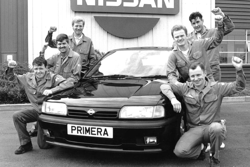 Now we motor forward to 1991 as Nissan staff Patrick Hore, Chris Hindmarsh, Gary Turnbull, Lee Brooks, Tony Curry and Ian Ingram celebrate as the first shipment of luxury Primera motors leaves Sunderland for Japan.