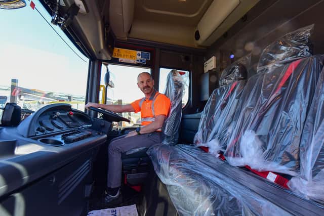 Workshop Manager John Stratton in the cab of Sunderland City Council's new Electric Refuse Collection Vehicle