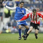 George McCartney of Sunderland holds off Tim Cahill of Millwall during the FA Cup Semi Final match between Sunderland and Millwall at Old Trafford.  (Photo by Gary M.Prior/Getty Images)