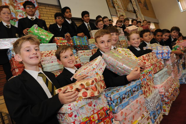 St Aidan's Catholic Academy pupils with over 200 shoeboxes collected for Operation Christmas Child. Recognise anyone?
