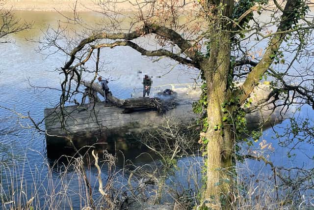 Two people spotted having a barbecue on a capsized boat on the River Wear