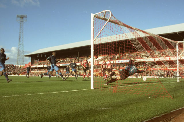 Sunderland v Aston Villa on October 26, 1996. Sunderland won 1-0 (Stewart). Paul Stewart (right) wheels away to celebrate his winning goal against Aston Villa, to the relief of David Kelly (left) whose penalty was saved.