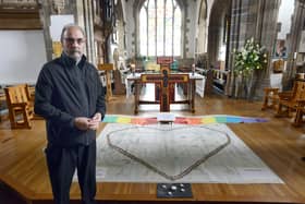 Canon Provost of Sunderland Minster Stuart Bain with a Covid 19 victims memorial earlier this year