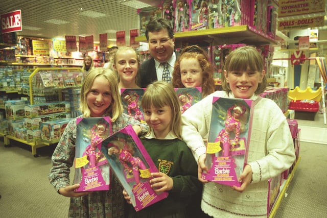 Excited winners collect their prizes at Joplings after the Chipper Club Barbie competition. What was your favourite childhood toy? This picture is rom July 1997.
Collected prizes at Joplings. Chipper Club