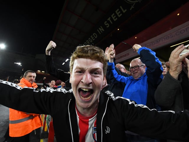 Sunderland fans celebrate their team's first goal during the Carabao Cup third round match between Sheffield United and Sunderland at Bramall Lane on September 25, 2019.