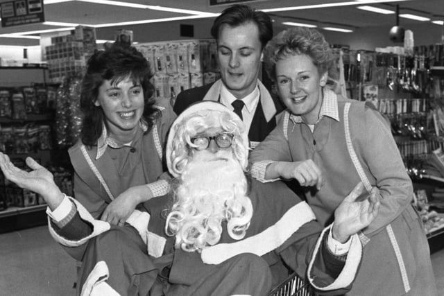Santa Claus visited Ryhope Co-op Superstore in 1987 and said hello to, left to right: Dianne Carrick, Mark McLaren grocery manager, and Jackie Caffrey. The Pet Shop Boys and Always On My Mind was the Christmas number 1.