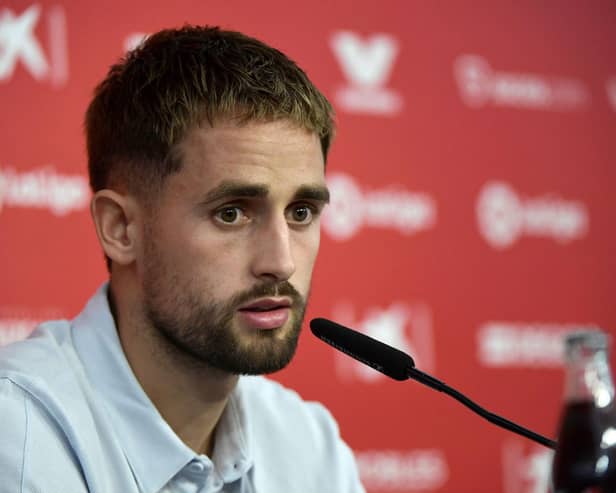 Belgian forward Adnan Januzaj talks to media during his official presentation as FC Sevilla football club's new player at the Ramon Sanchez Pizjuan stadium in Seville on September 7, 2022. (Photo by CRISTINA QUICLER / AFP) (Photo by CRISTINA QUICLER/AFP via Getty Images)