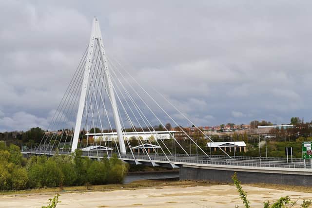 Police were called to the Northern Spire Bridge after a man was on the wrong side of the railings.