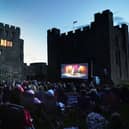 Outdoor cinema event at Bamburgh Castle