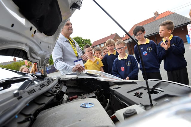 Under the bonnet at Fulwell Junior School during careers week in 2016.