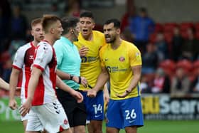 Bailey Wright after conceding a late penalty at Fleetwood.