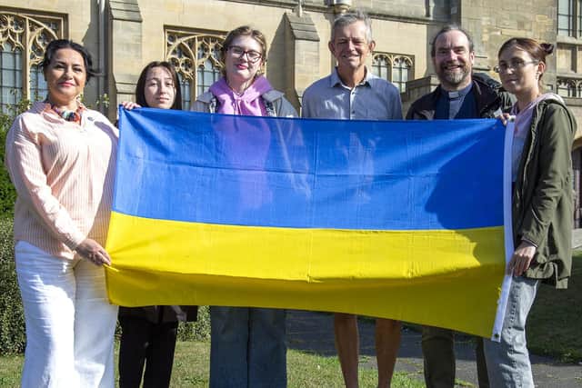 (Left to right) International Community of Sunderland representative Olena Davie, Ukrainian refugees Nastya, 19, and Olah, 18, chair of Friends of the Drop In for Asylum Seekers and Refugees Steve Newman, 65, Reverend Chris Howson, 52, and Nastya's mother Inna, 39.