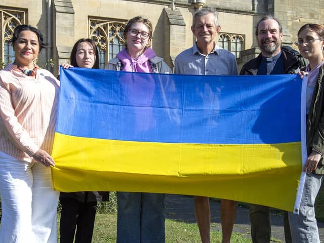 (Left to right) International Community of Sunderland representative Olena Davie, Ukrainian refugees Nastya, 19, and Olah, 18, chair of Friends of the Drop In for Asylum Seekers and Refugees Steve Newman, 65, Reverend Chris Howson, 52, and Nastya's mother Inna, 39.
