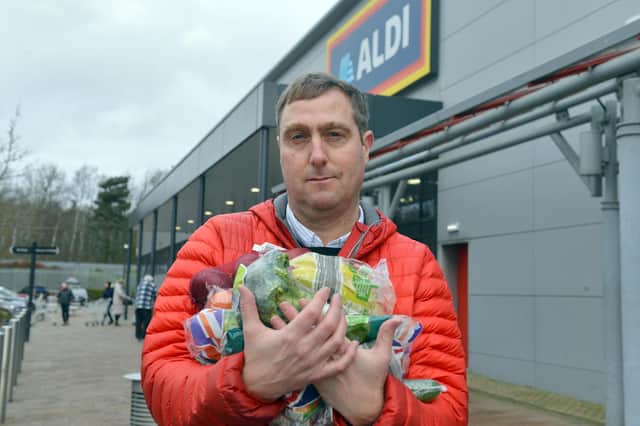 Sunderland Echo reporter Neil Fatkin with the fruit and veg he bought.